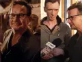 Bartłomiej Topa w okularach, z kubkiem w dłoni, a obok niego rozmowa z dziennikarzem. Nominacje czekają!