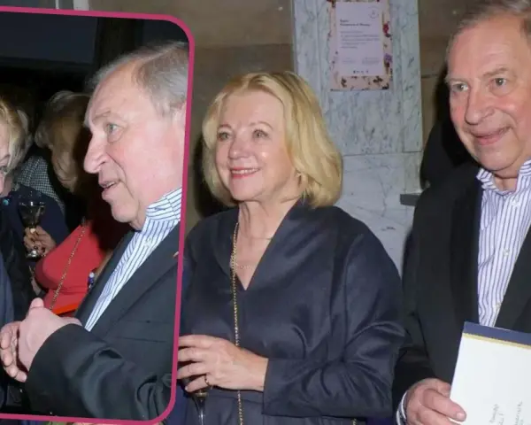 Barbara Stuhr w rozmowie z mężczyzną, oboje z kieliszkami w dłoniach.